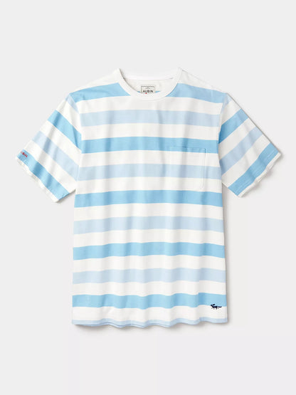 A short-sleeve crewneck t-shirt with horizontal light blue and white stripes, featuring a small chest pocket and a small embroidered logo near the bottom hem.