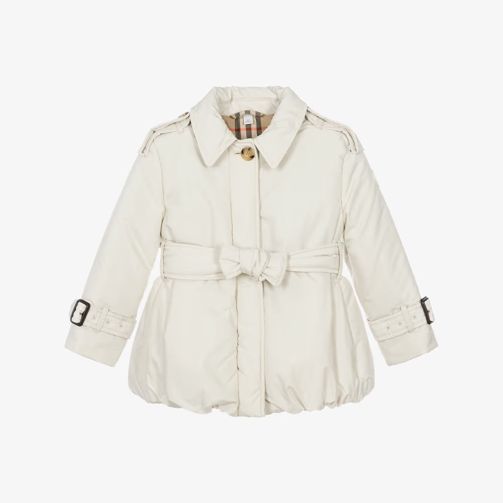 A cream-colored Burberry children's trench coat with a matching waist tie belt, shown against a plain white background.