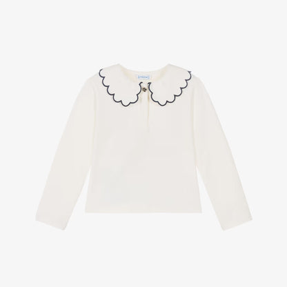 An off-white long-sleeve top for toddlers, featuring a decorative scalloped Peter Pan collar outlined in black and a small embroidered bee at the center, displayed on a clean white background.